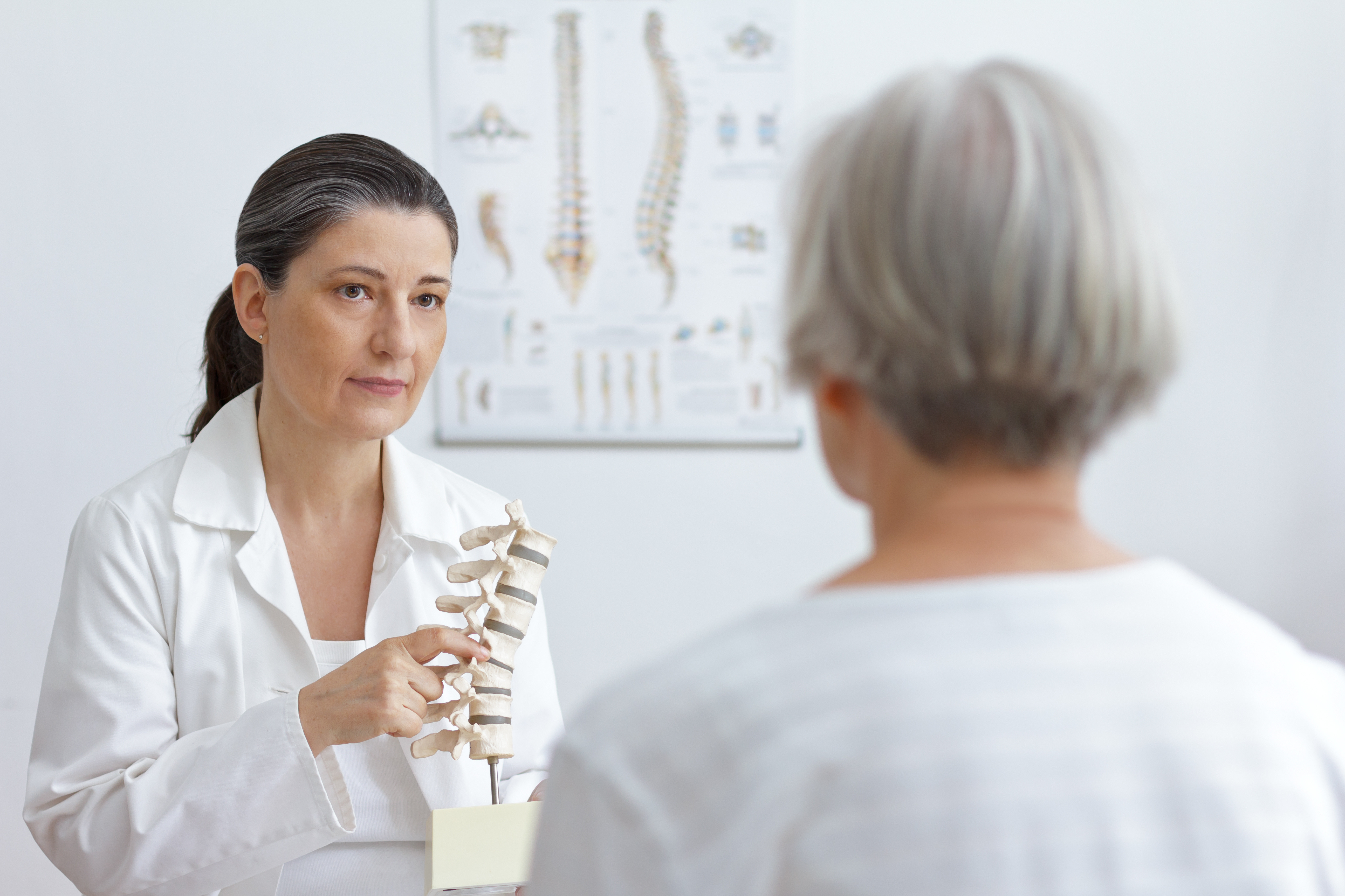 Physiotherapist discussing bone health with WA health Group patient