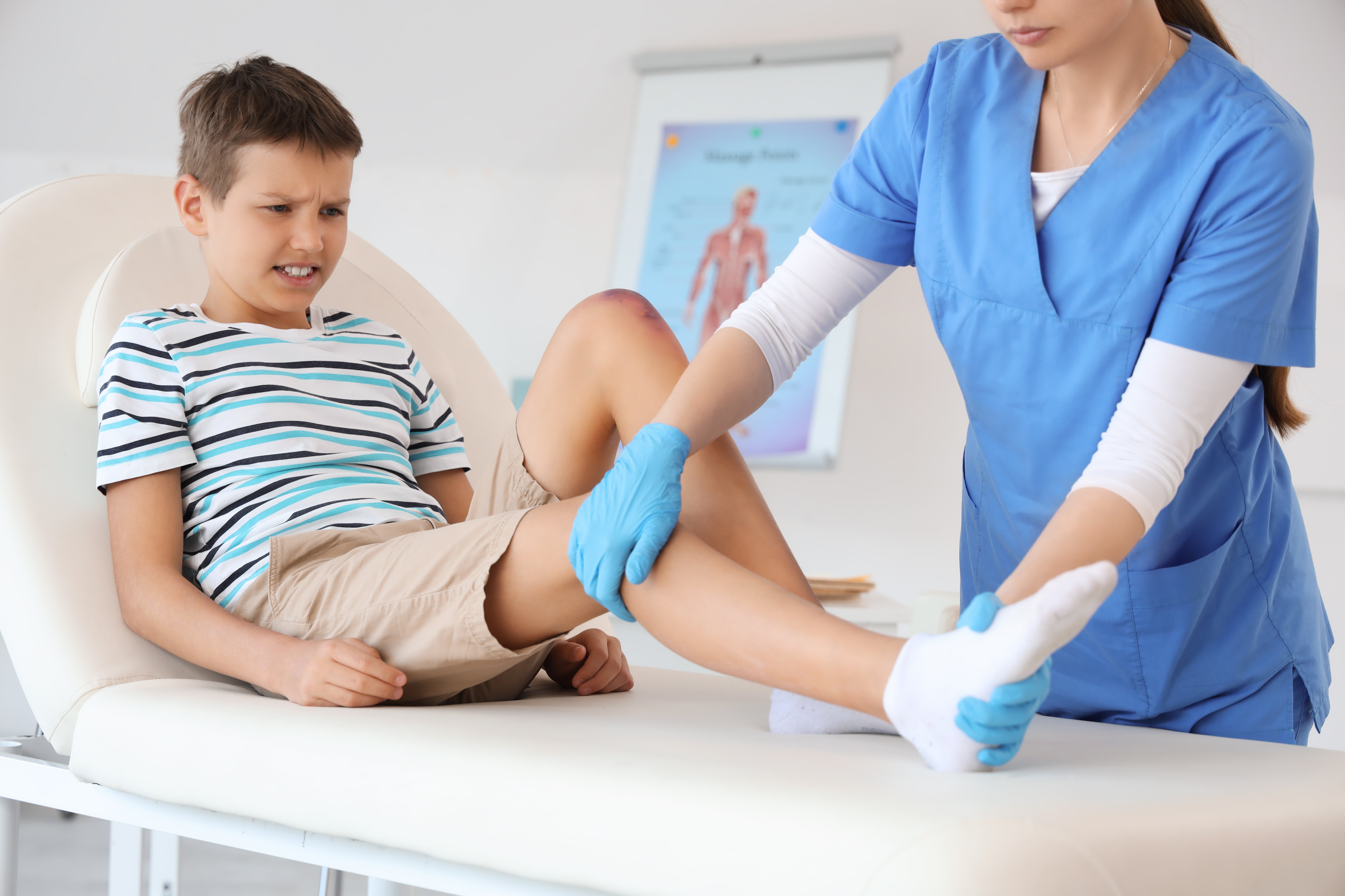 Clinician helping a child at WA Health Group